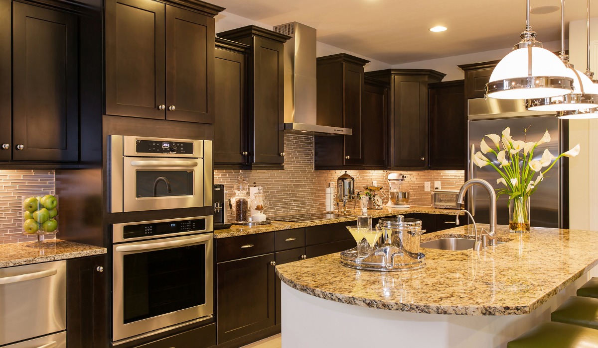 Contemporary kitchen with dark wood cabinets