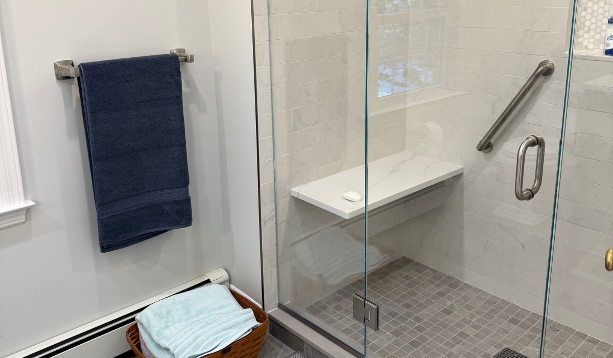 Modern bathroom featuring a glass-enclosed shower