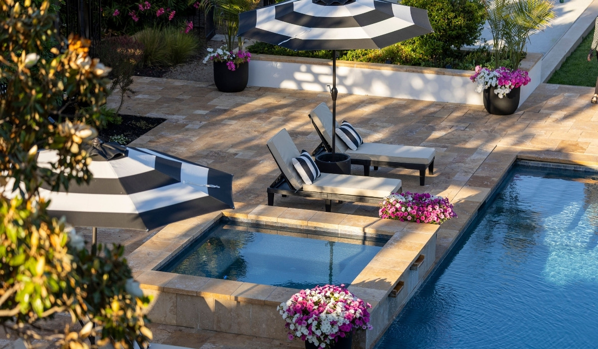 upscale backyard patio featuring a swimming pool